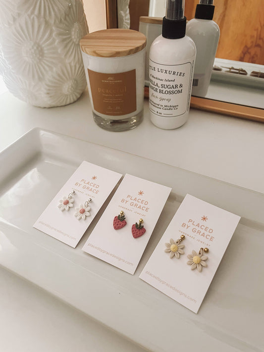 Placed by Grace - Mini Pink Daisy Dangle Earrings The Secret Garden Bookery